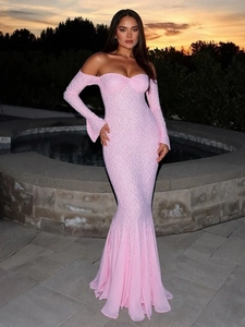 Elegant pink off-shoulder lace mermaid evening dress with long sleeves in a sunset garden