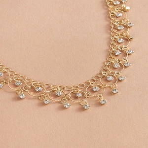 Gold zircon teardrop necklace with geometric fringe tassels and sparkling rhinestones