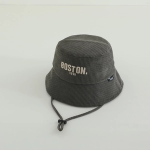 Detail of grey corduroy bucket hat with Boston embroidery and adjustable windproof cord
