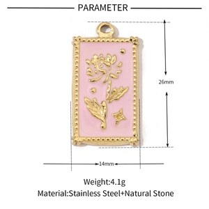 Detail view of a 26mm square gold stainless steel floral pendant with natural stone specs