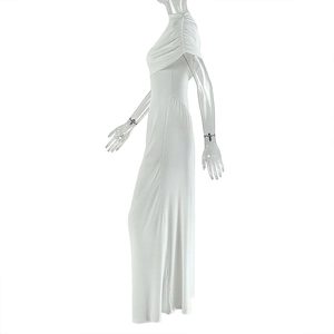 Detail of white side-ruched maxi dress with elegant draping and sleeveless neckline