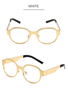 Détail de lunettes de soleil ovales en métal avec verres clairs et plaquettes de nez fixes