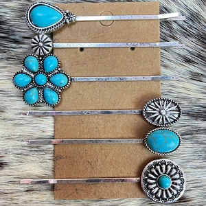 Close-up of 6-piece bohemian turquoise hair clip set with vintage silver floral patterns