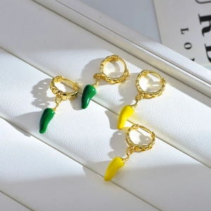 Detail of green and yellow chili pepper earrings with gold plated textured hoops