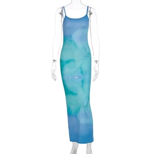 Detail of blue and emerald green watercolor print on a slim fit backless maxi dress