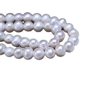 Elegant white freshwater pearl necklace featuring a classic butterfly clasp design
