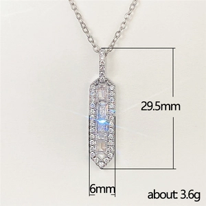 Silver geometric necklace with rectangular pendant and clear baguette-cut stones