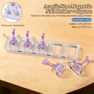Detail of acrylic nail display stand with five purple tips and rectangular clear base