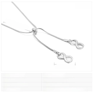 Macro detail of stainless steel snake chain with infinity pendant and size dimensions