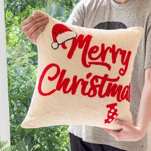 Tufted Christmas pillow cover with red Merry Christmas embroidery and holiday motifs