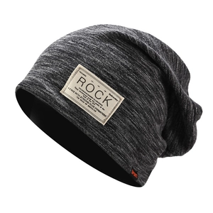 Deep grey knitted slouchy beanie hat for women featuring stylish sport patch labels