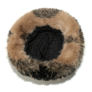 Detailed view of winter faux fur bucket hat with warm quilted black nylon lining