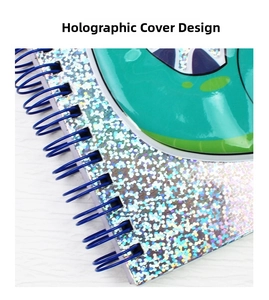 Detail of glitter laser notebook cover with cute cartoon patterns and blue spiral coil