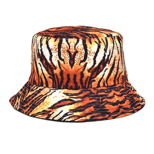 Double-sided bucket hat with orange and black tiger print for sun protection