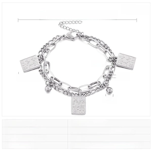 Detailed view of double-layer stainless steel bracelet with poker card charm and metal beads