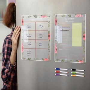 Magnetic acrylic weekly planner and to-do list with floral patterns on a fridge