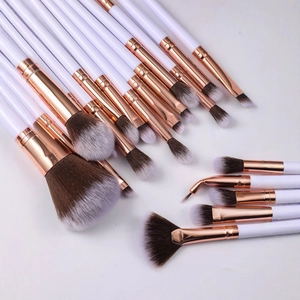 Set of 20 professional makeup brushes with white handles and rose gold metal ferrules