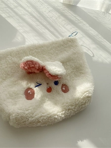 Cute bunny plush cosmetic bag in white lamb wool with embroidered rabbit ears and zipper