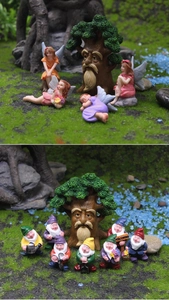 Vista dettagliata di gnomi da giardino e miniature di spiriti degli alberi su muschio