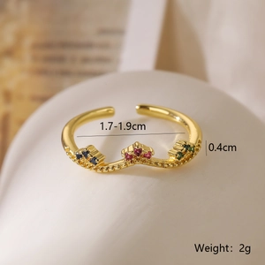 Macro detail of crown ring with blue red green crystals and size measurements