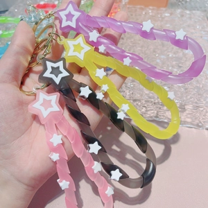 Luminous quicksand bottle keychain with colorful spiral star charms for student schoolbags