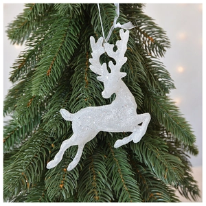 Sparkling white reindeer Christmas tree ornament with glitter finish on green branch