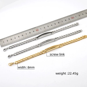 Detail of 8mm titanium steel Cuban chain bracelets showing gold and silver finishes