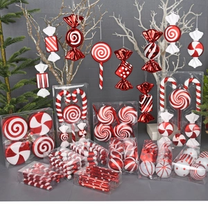 Close-up of red and white candy cane hanging ornaments for Christmas ceiling decoration