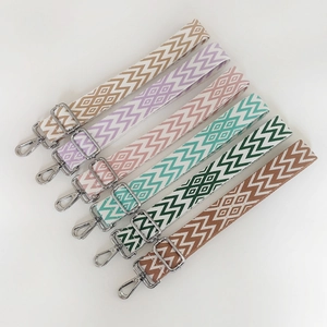 Detail showing adjustable colorful zigzag straps with silver metal snap hooks