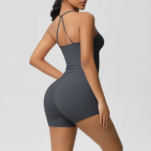 Detail of cross-back straps on dark grey moisture-wicking yoga jumpsuit for women