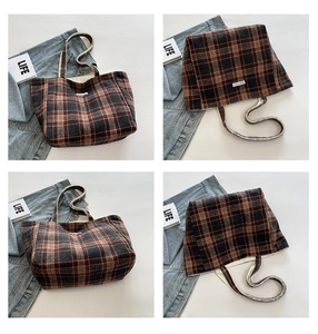 Detailed views of a dark brown checkered wool handbag with retro stitching on white linen