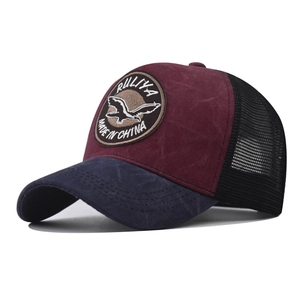 Vintage washed baseball cap with wild goose embroidery and breathable mesh trucker design