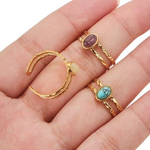 Vintage gold-plated textured open rings with colorful stones in turquoise, purple, and beige