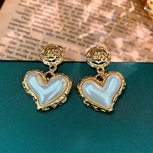 Elegant gold hollow flower and heart pearl drop earrings for women with vintage finish