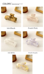 Collection of colorful marble pattern acrylic hair claws in multiple floral finishes