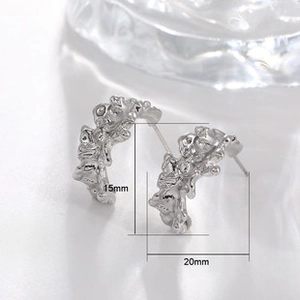 Detail showing dimensions of silver mesh heart hoop earrings with a lava texture