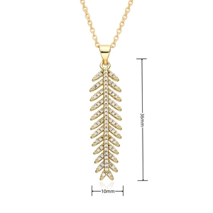 Detail view of gold-plated leaf pendant showing 36mm length and 10mm width dimensions