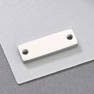 Macro shot of 15x5mm rectangular stainless steel pendant with double holes and mirror finish
