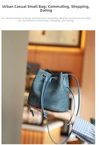 Detail of blue denim bucket bag with drawstring closure and slim shoulder strap