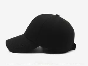 Detailed side view of black baseball cap with premium embroidery and textured cotton