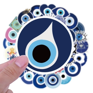 Macro shot showing blue evil eye stickers with waterproof texture and vibrant details