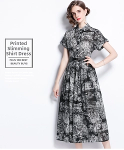 Detailed view of animal print shirt dress with collar and waist belt accessory