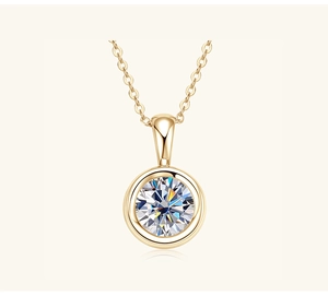 Close-up of golden S925 sterling silver necklace with a round-cut moissanite pendant