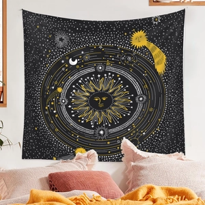Detailed view of sun and moon tapestry with celestial stars on a bedroom wall