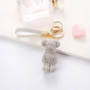 Sparkling teddy bear keychain with rhinestones and golden hardware for bags