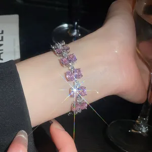 Detailed shot of double-layer zircon bracelet with pink purple stones in silver finish