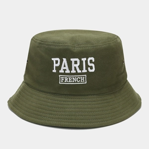 Detail of white PARIS embroidery and metal eyelets on olive green cotton bucket hat