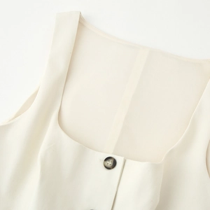 Chic cream square neck buttoned vest with amber patterned buttons and sleeveless design