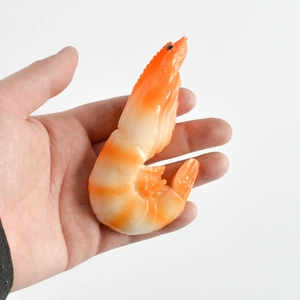Realistic artificial cooked shrimp keychain charm with detailed orange seafood texture