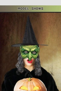 Detailed view of Halloween witch costume set featuring green face mask and wizard hat